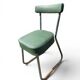 Vintage green faux leather chair with metal frame, 1960s.