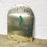 Brass half-moon mirror