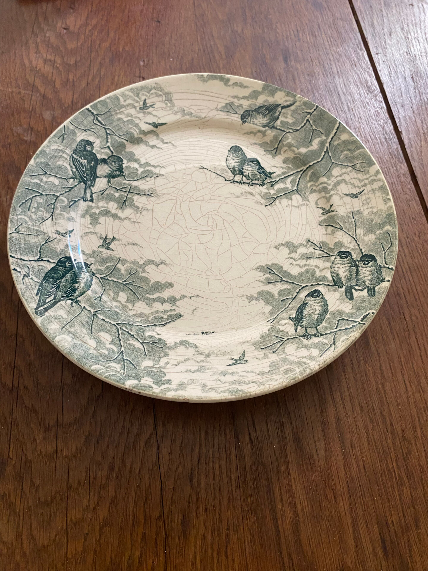 Plate on a presentation stand stamped U&C Sarreguemines Neige.