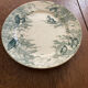 Plate on a presentation stand stamped U&C Sarreguemines Neige.