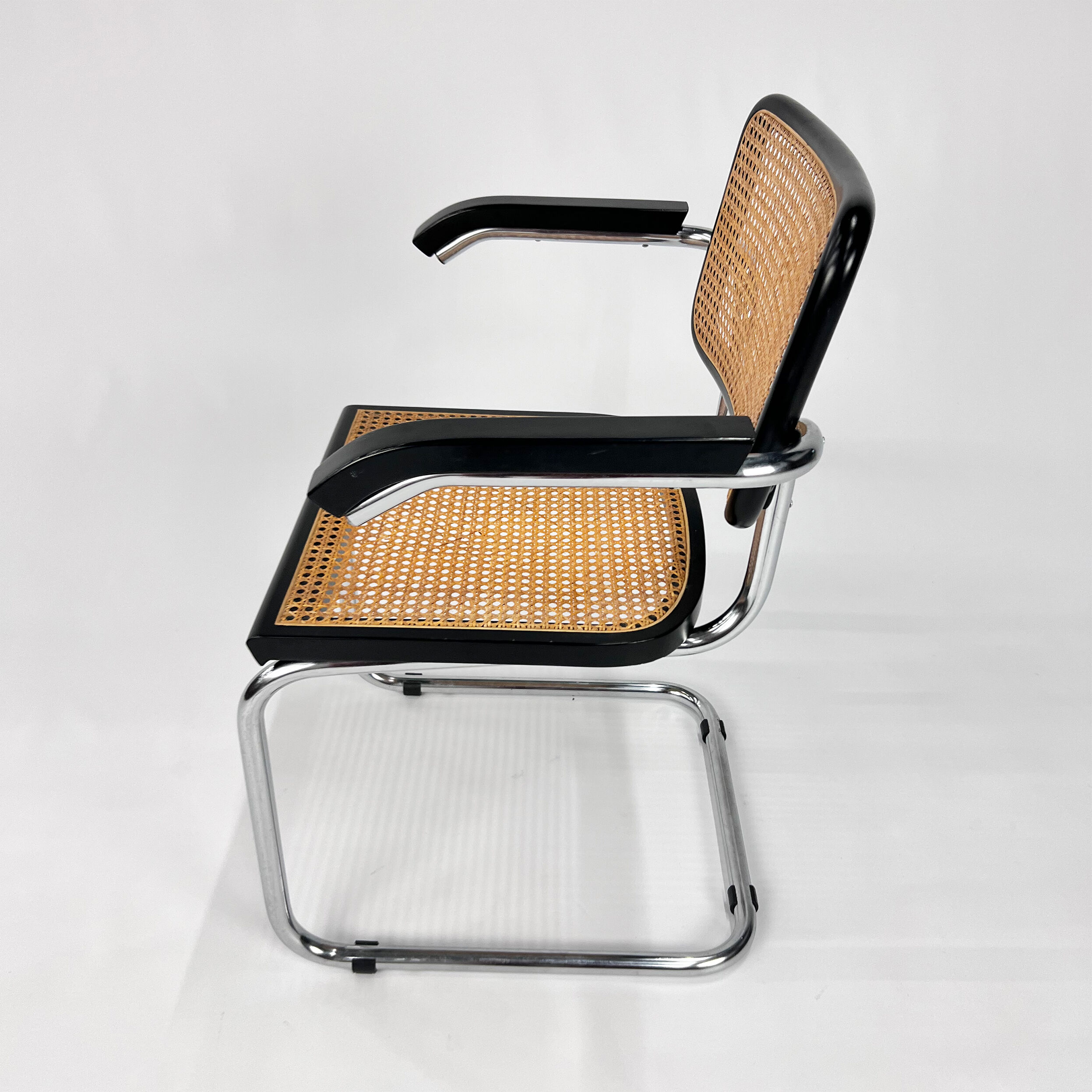Tubular frame and cane cantilever dining chair, Italy, 1970s