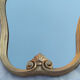 Miroir doré en forme de lyre, 30x45cm