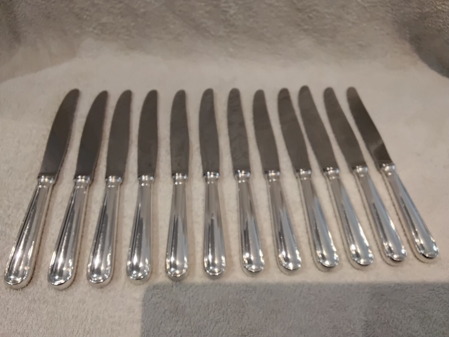 12 silver-plated table knives by Christofle, Albi pattern