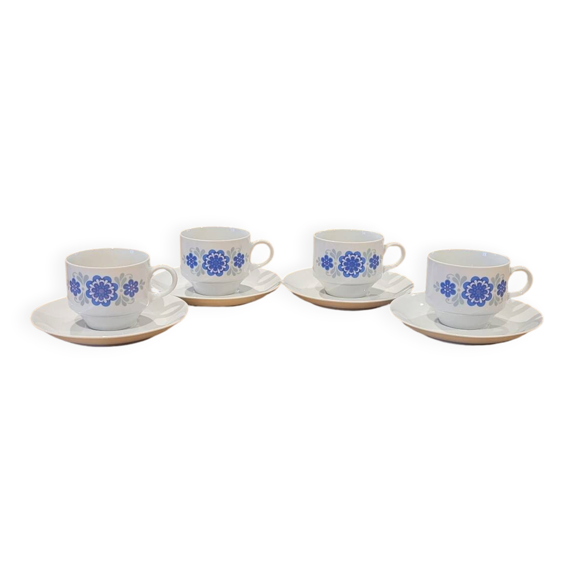 4 vintage coffee cups and their saucers