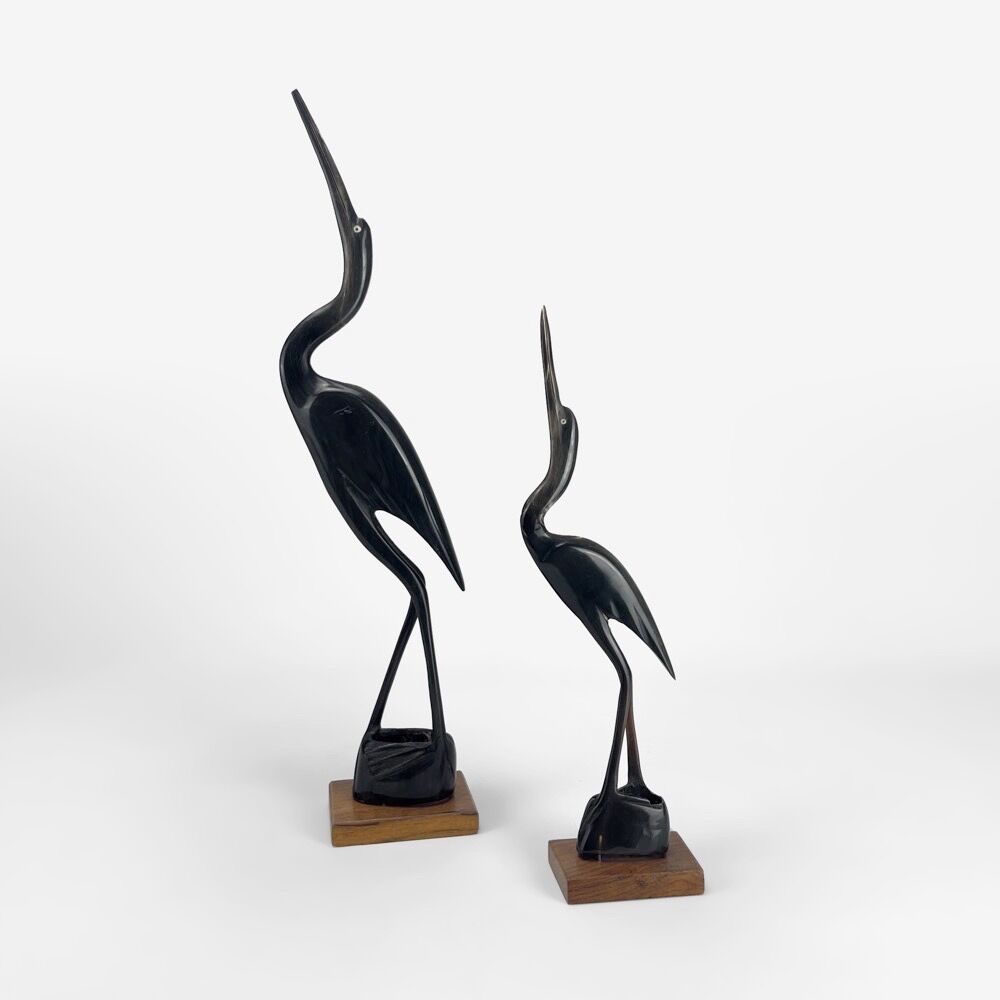 Pair of cranes in carved horn design Mid-Century