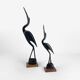 Pair of cranes in carved horn design Mid-Century