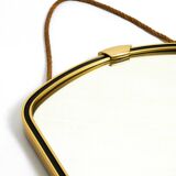 Beautiful small mid-century brass wall mirror with braided hanging strap
