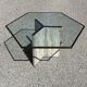 Dining table in travertine, glass top and brass (c.1980)