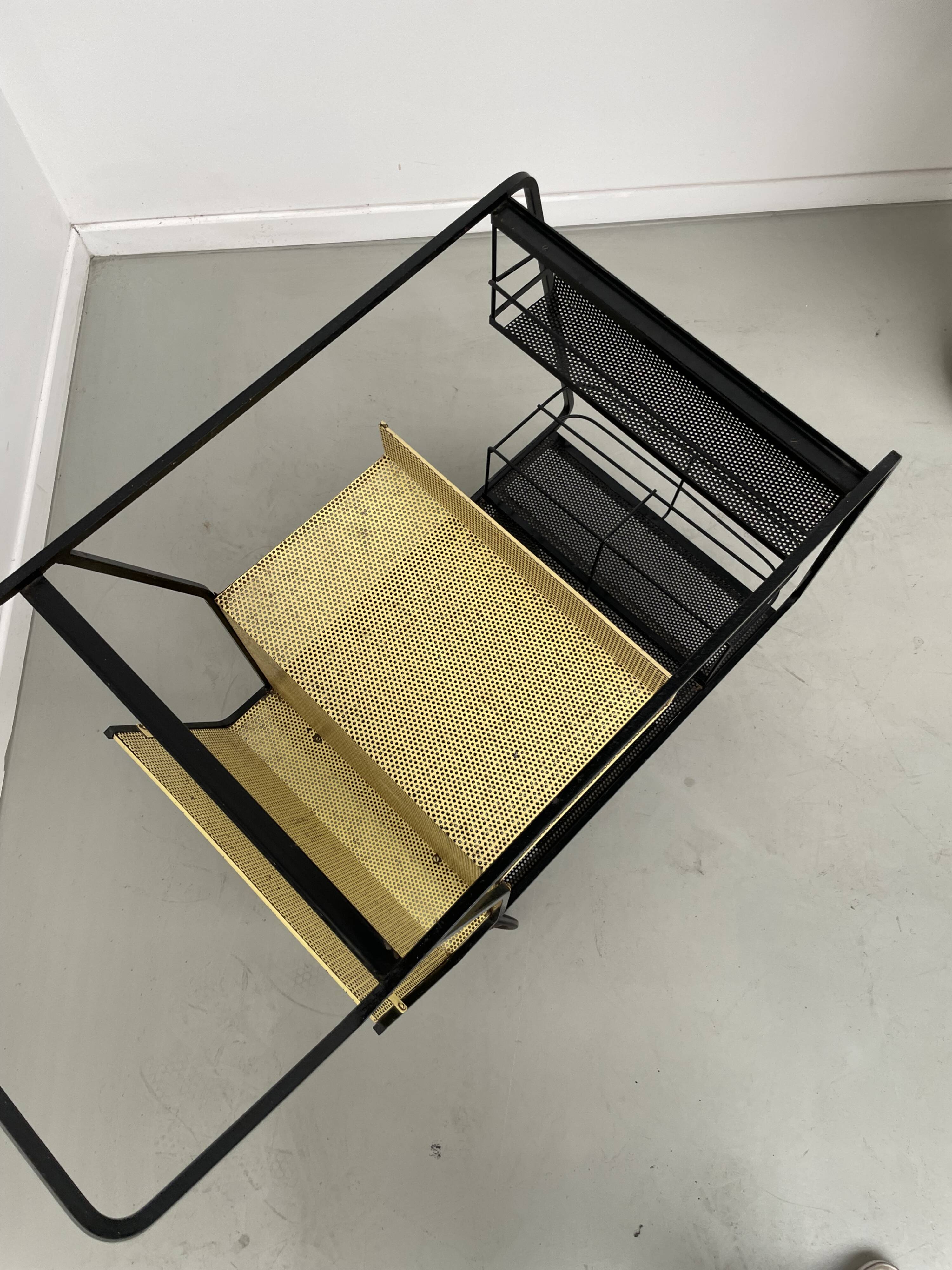 Perforated metal serving trolley in the Mathieu Matégot style