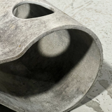 Coffee table "Loop" by Willy Guhl for Eternit, 1999 edition.