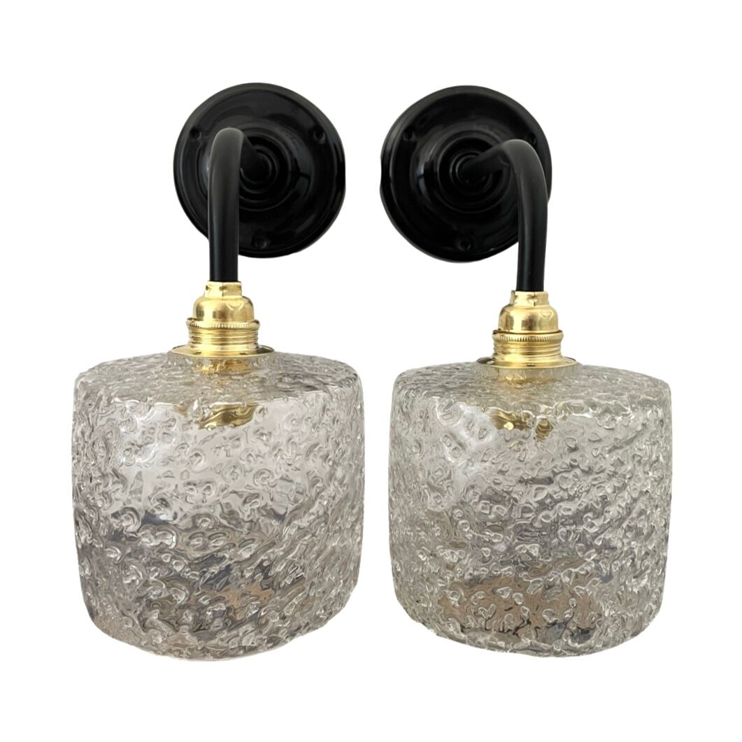 Set of two chiseled glass sconces