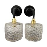 Set of two chiseled glass sconces