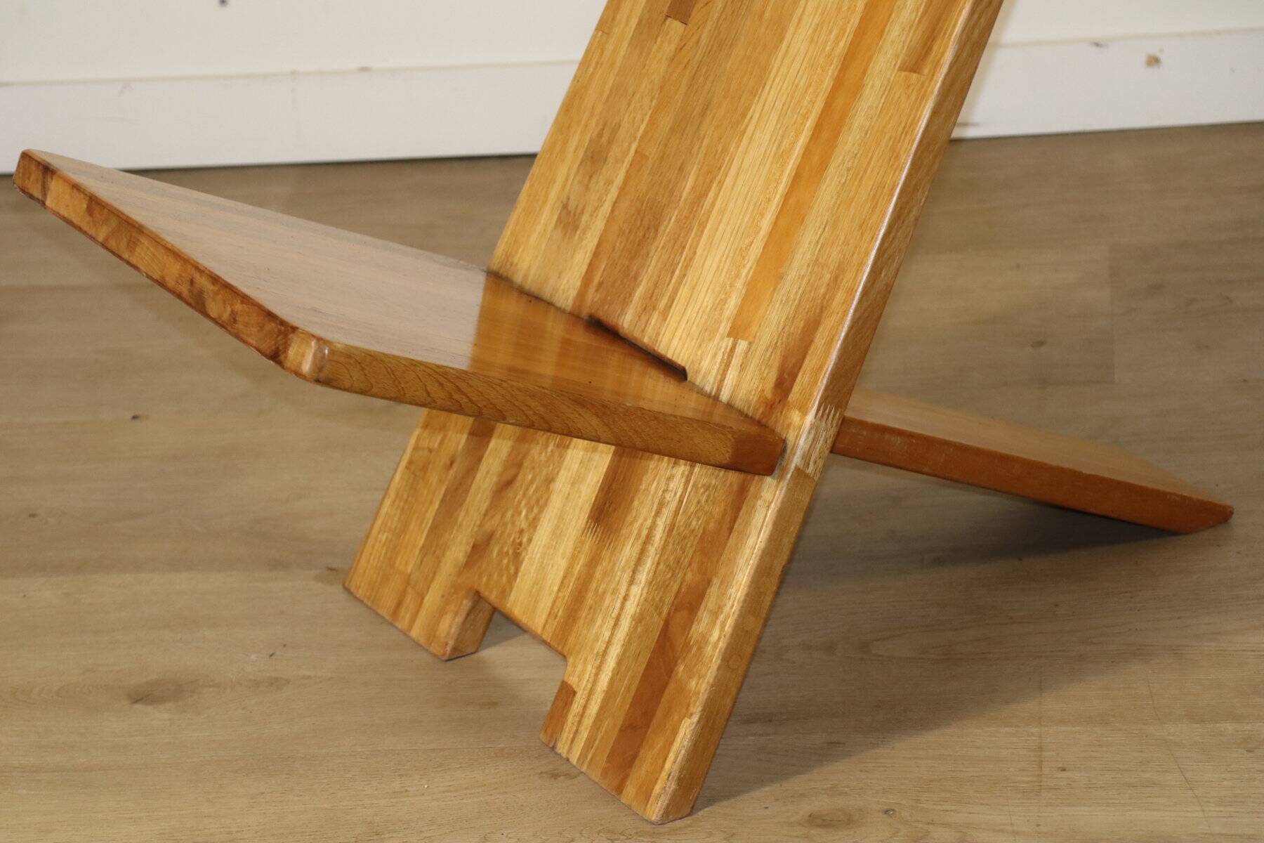 Sculptural brutalist armchair in solid elm, 1980.