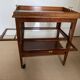 Serving Light mahogany English tea table. Beveled windows. circa 1900. Removable glass top.