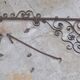 Wrought iron sign gallows