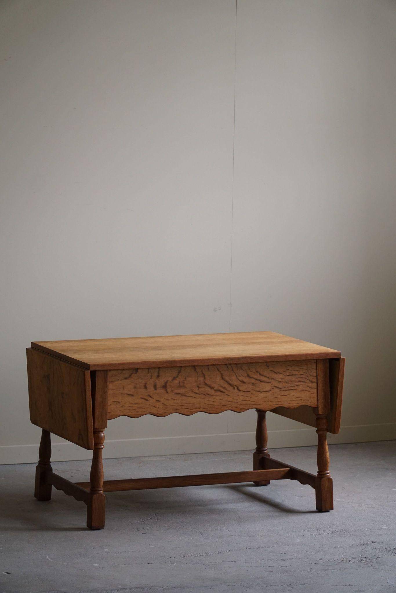 Danish folding table from the mid-century with a drawer in oak, Henning Kjærnulf, 1960s.