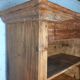 Antique rustic wardrobe in raw wood