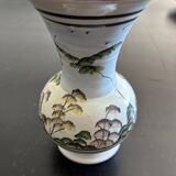 White vase with plant decoration