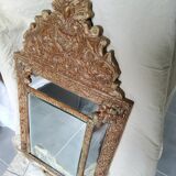 Mirror with parecloses