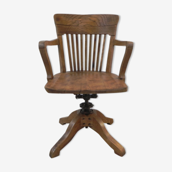 Oak office chair with spring mechanism and armrests