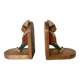 Old wooden bookends with painted characters