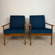 a pair of Scandinavian armchairs in teak from the 1960s
