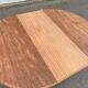 Renovated round extendable dining table made of solid mahogany from the 19th century.