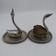 Ring holders, swans