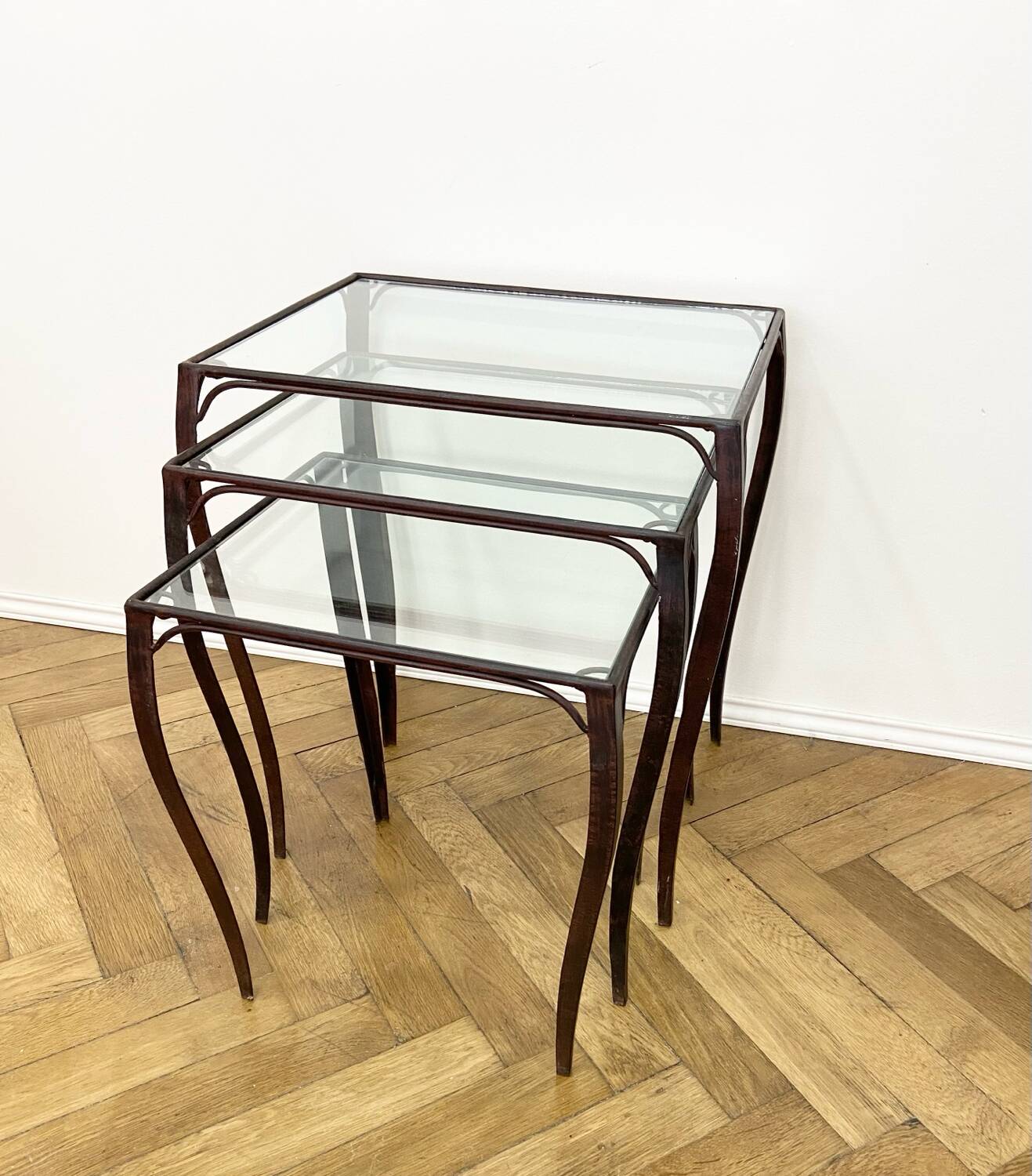 Nesting tables in wrought iron and glass