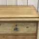 English chest of drawers in nineteenth century fir with its glass buttons