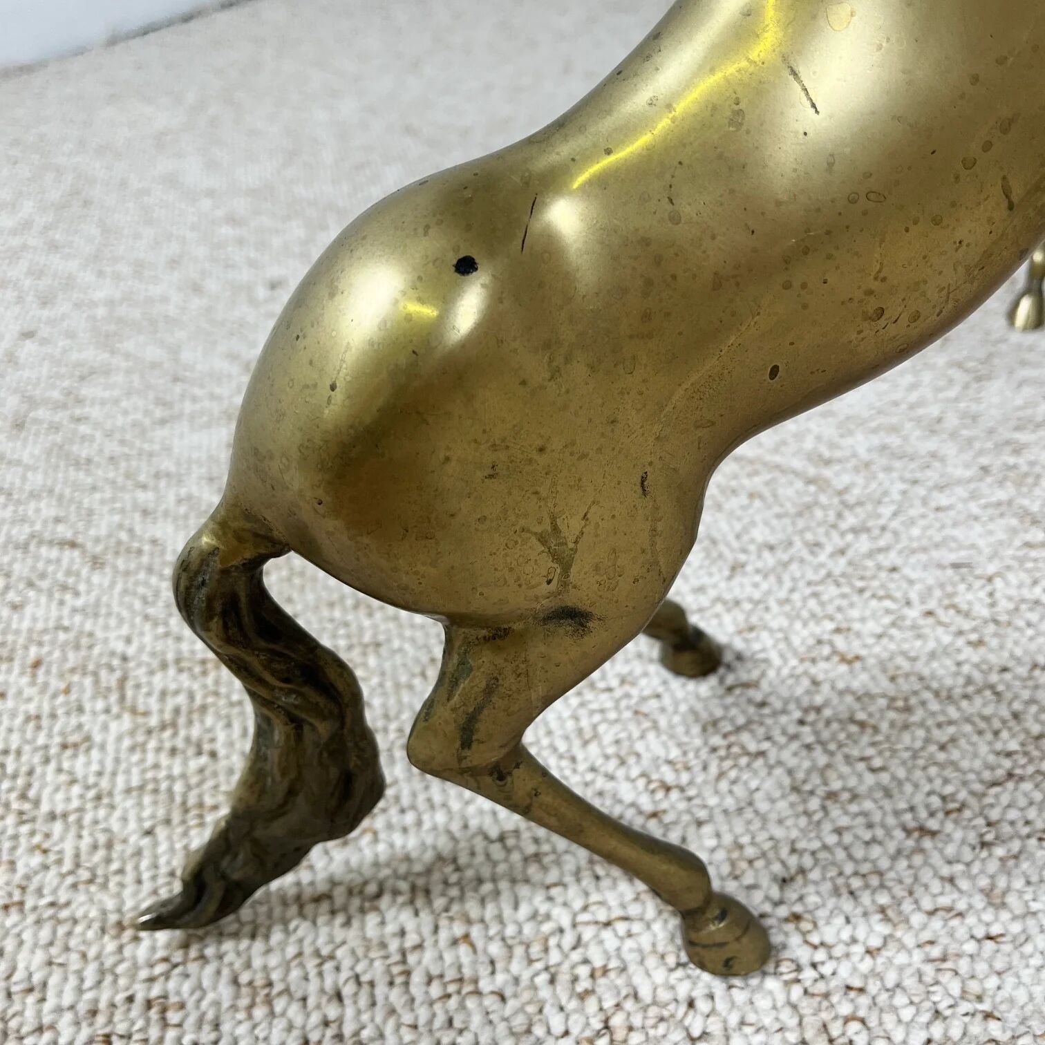 Hollywood Regency style coffee table, 6 patinated brass horses and glass top, 1970.