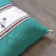 Moroccan Berber cushion in green and white.
