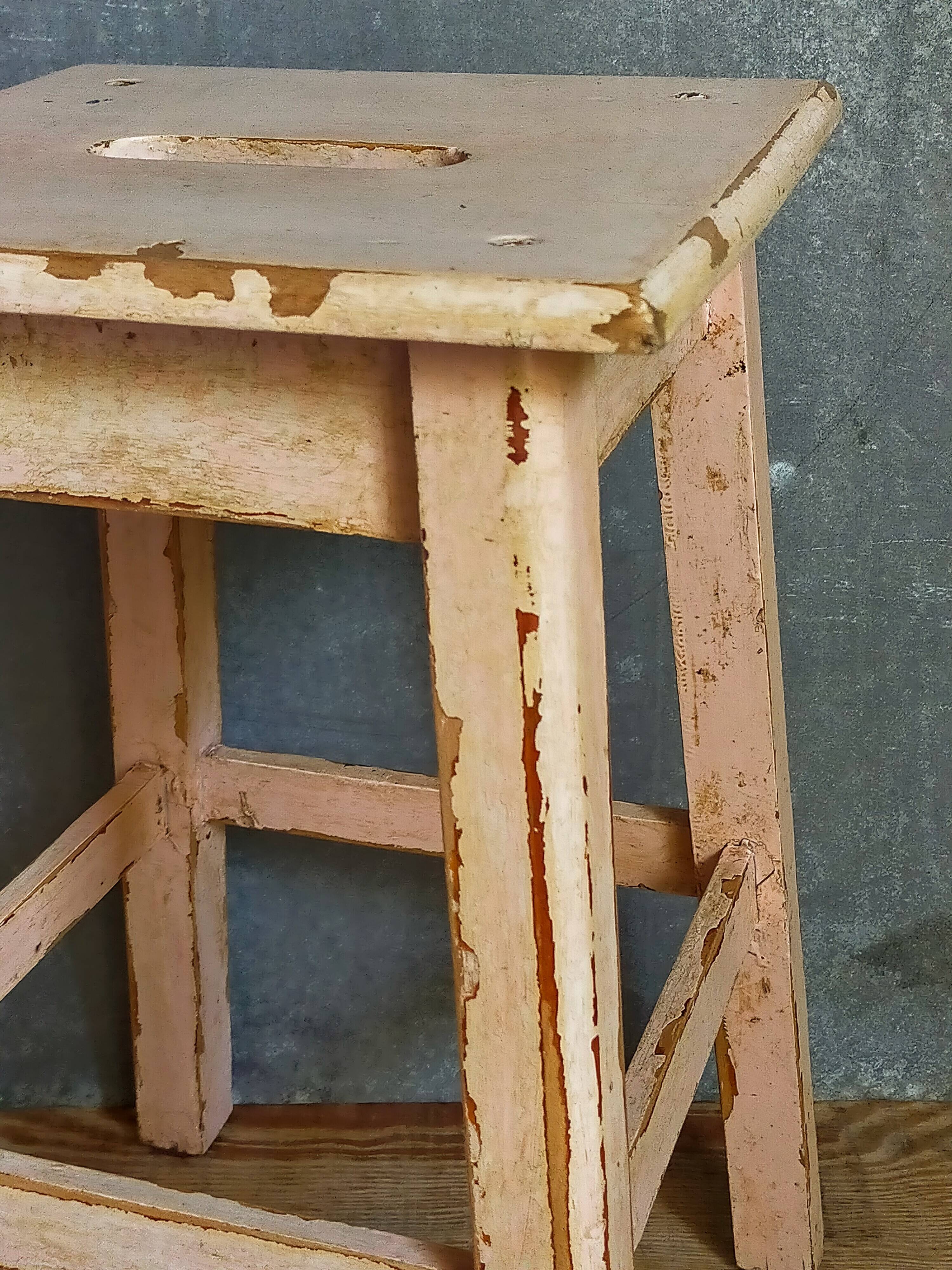 Antique workshop stool in patinated solid wood