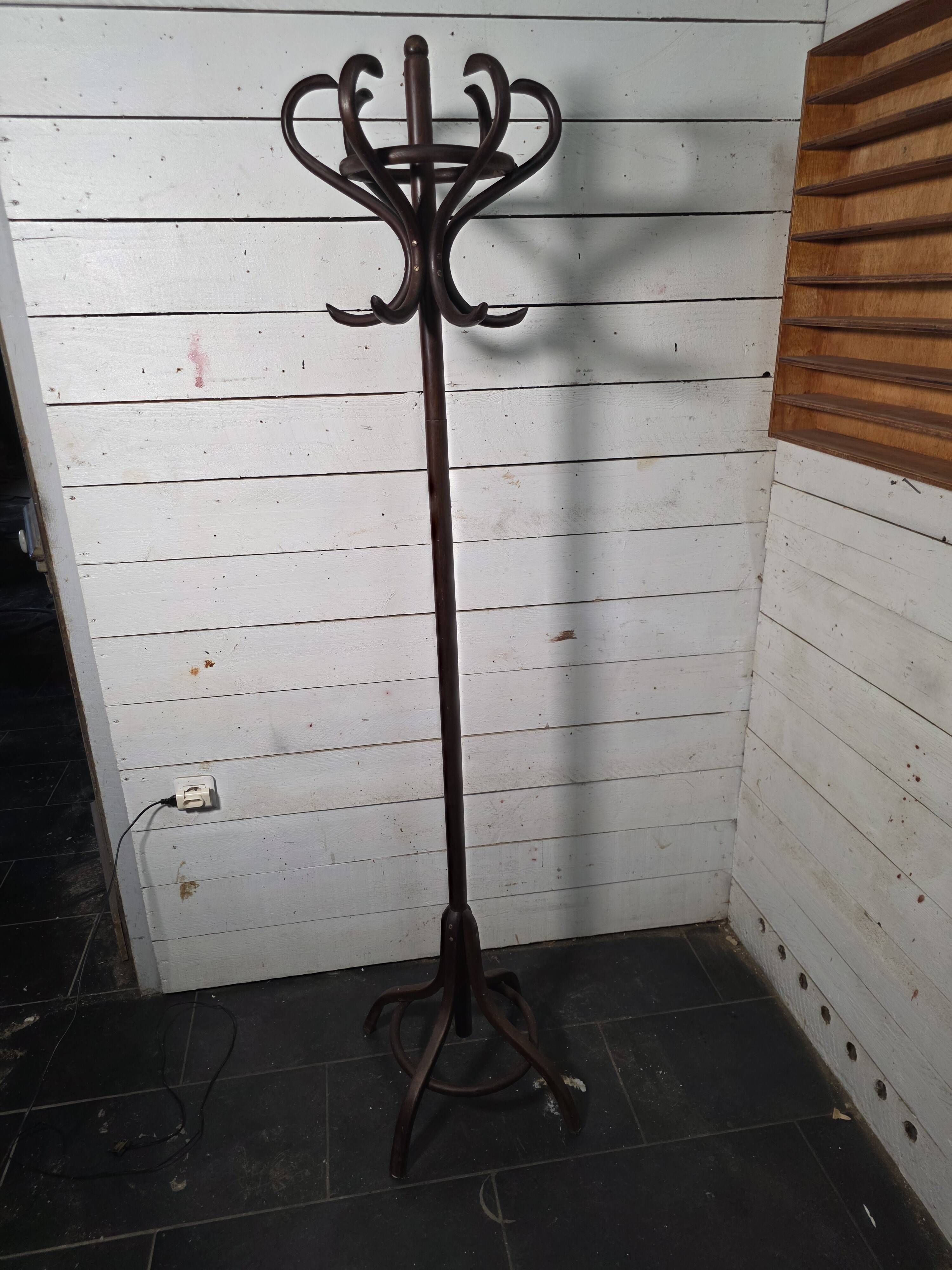 Curved antique wooden parrot