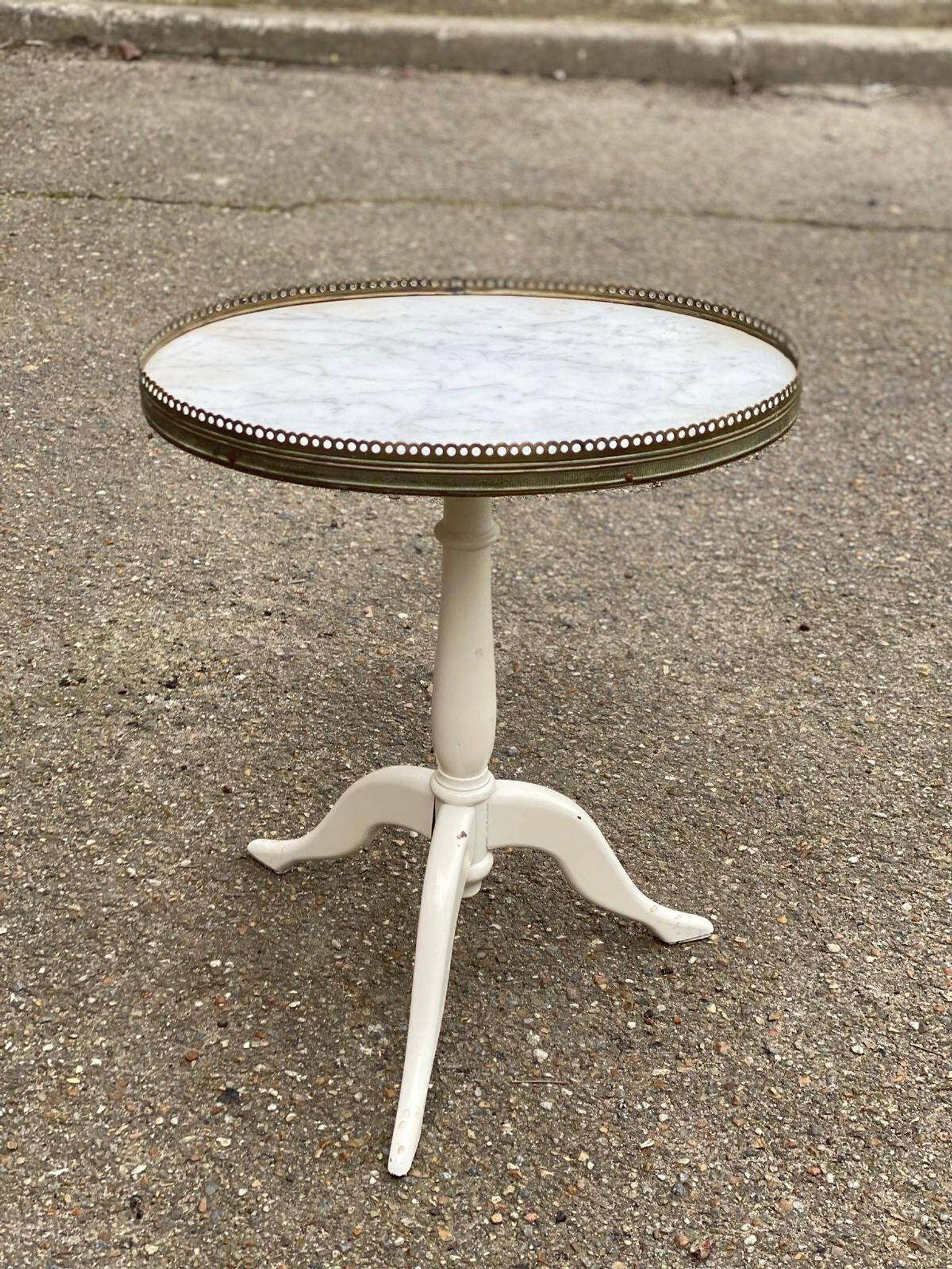 Pair of marble and ivory tripod pedestal tables