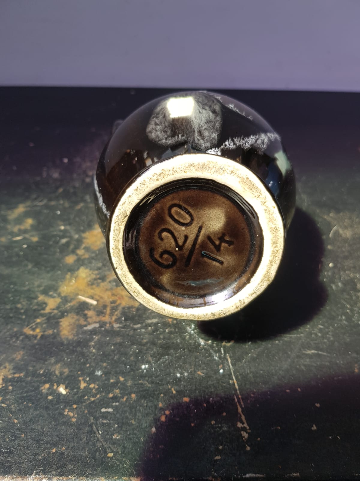 Old vase with coves ceramic black