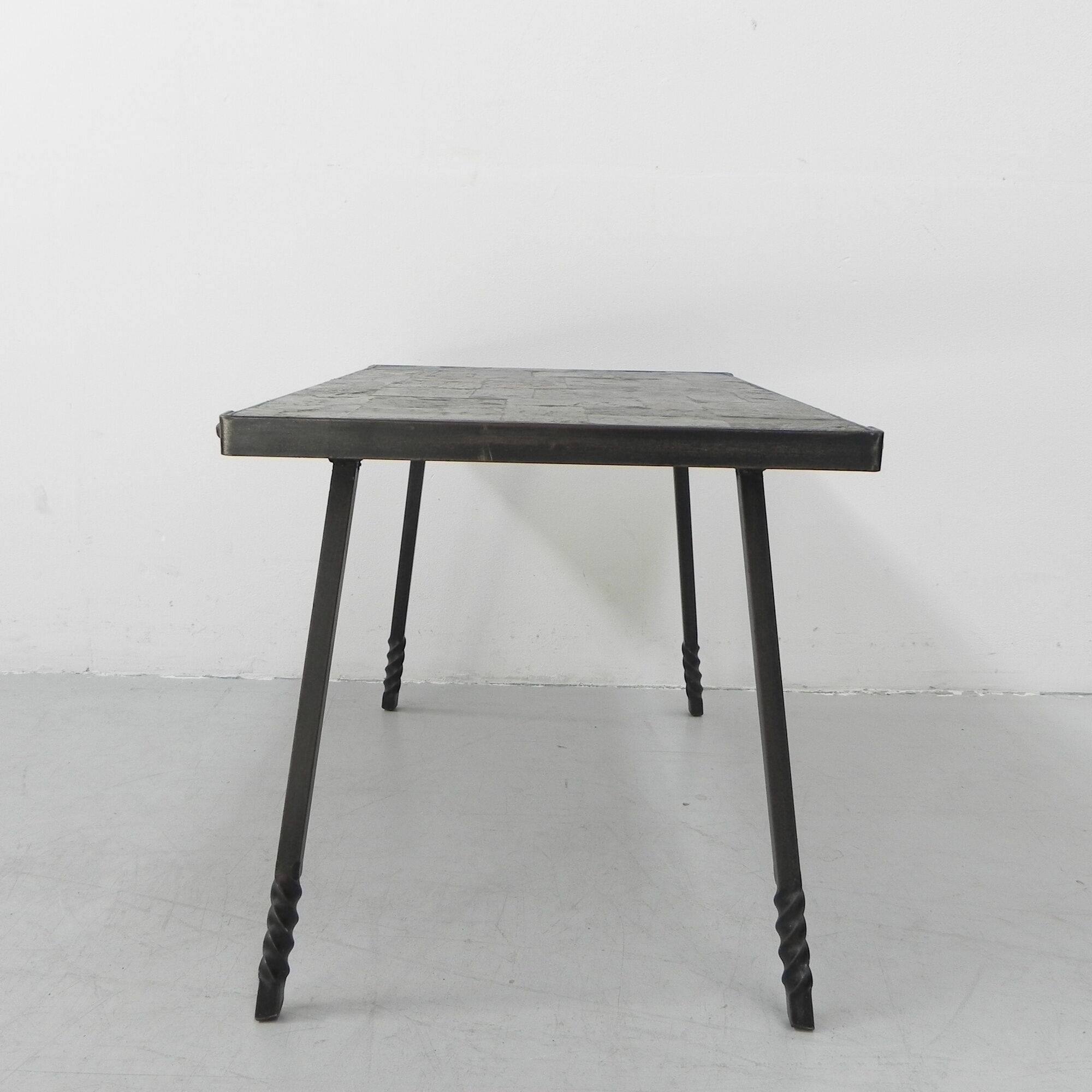Brutalist coffee table with slate top