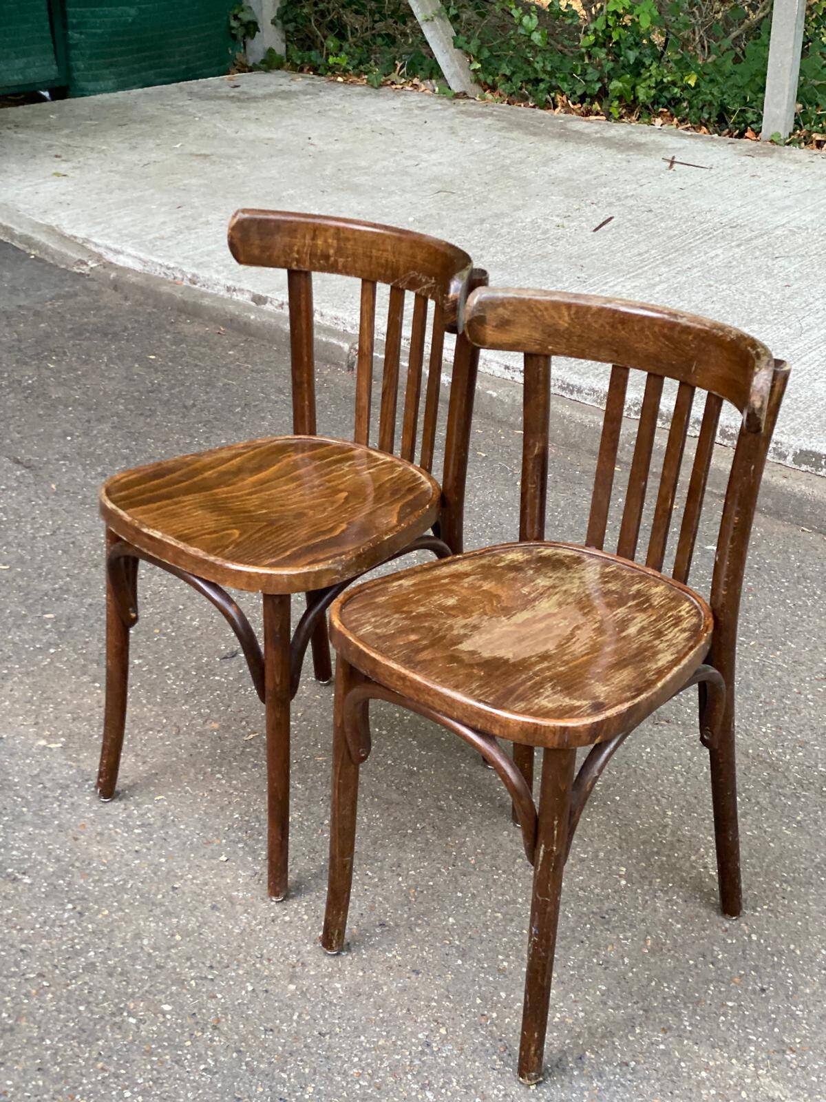 2 solid wood curved walnut bistro chairs in burgundy
