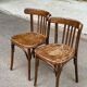 2 solid wood curved walnut bistro chairs in burgundy