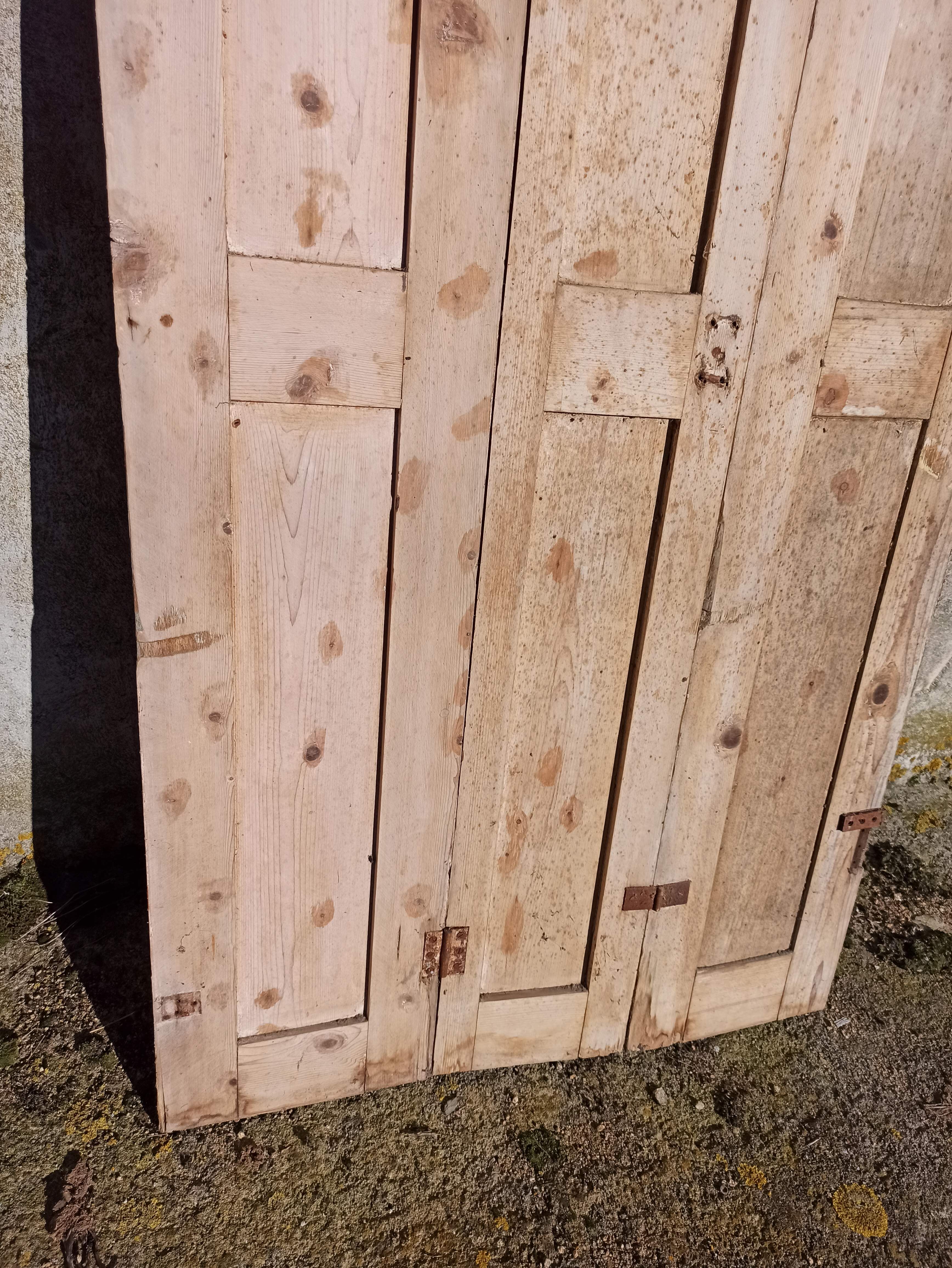 Old trio of wooden screen doors