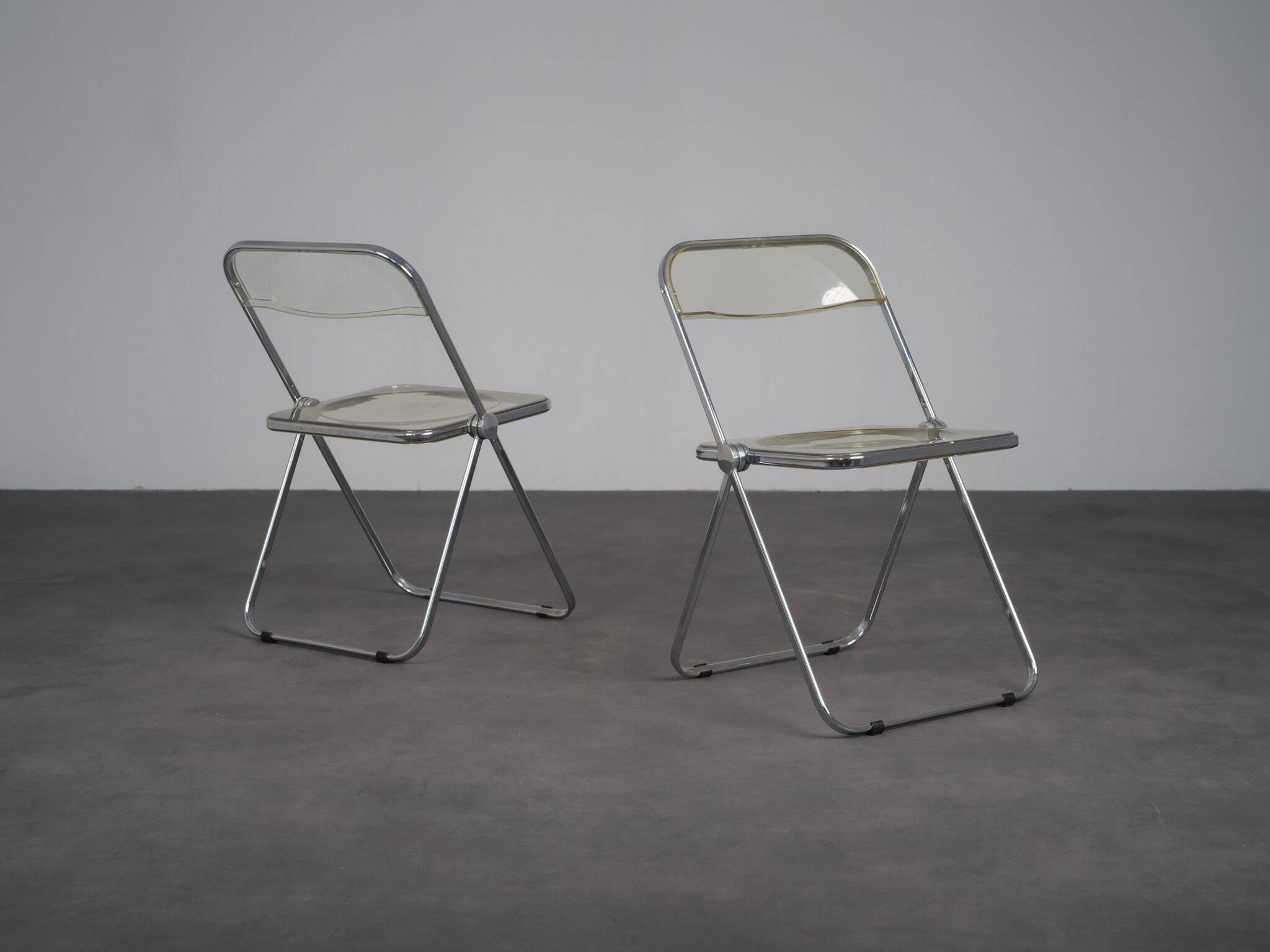 Pair of Plia folding chairs by Giancarlo Piretti for Castelli, Italy, 1970s