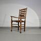 Ensemble de 4 chaises de salle à manger en chêne, rustiques, de ferme, à dossier en échelle avec sièges en jonc, années 1960