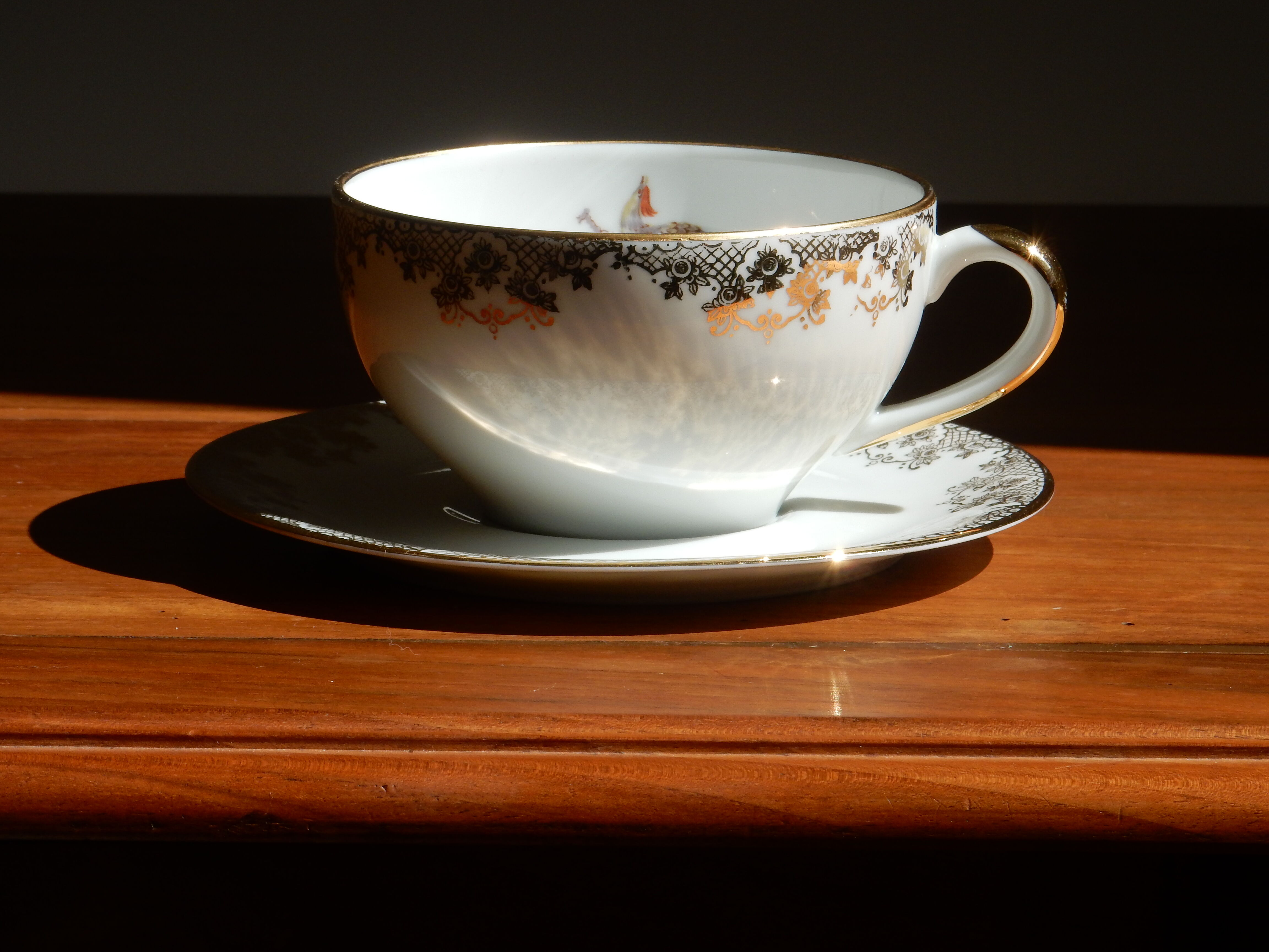 Charles Ahrenfeldt's teacup and subcup limoges