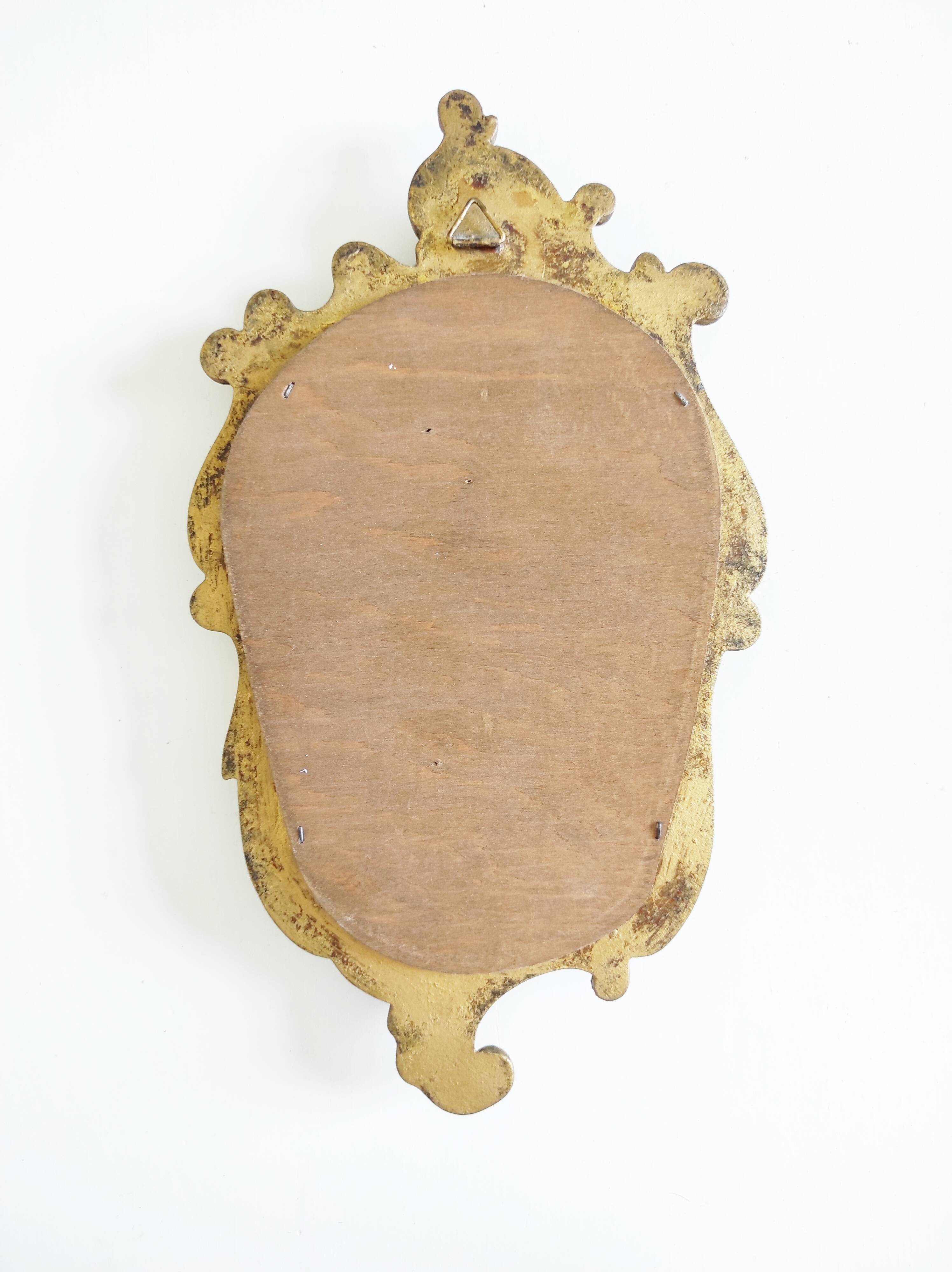 Miroir en bois doré