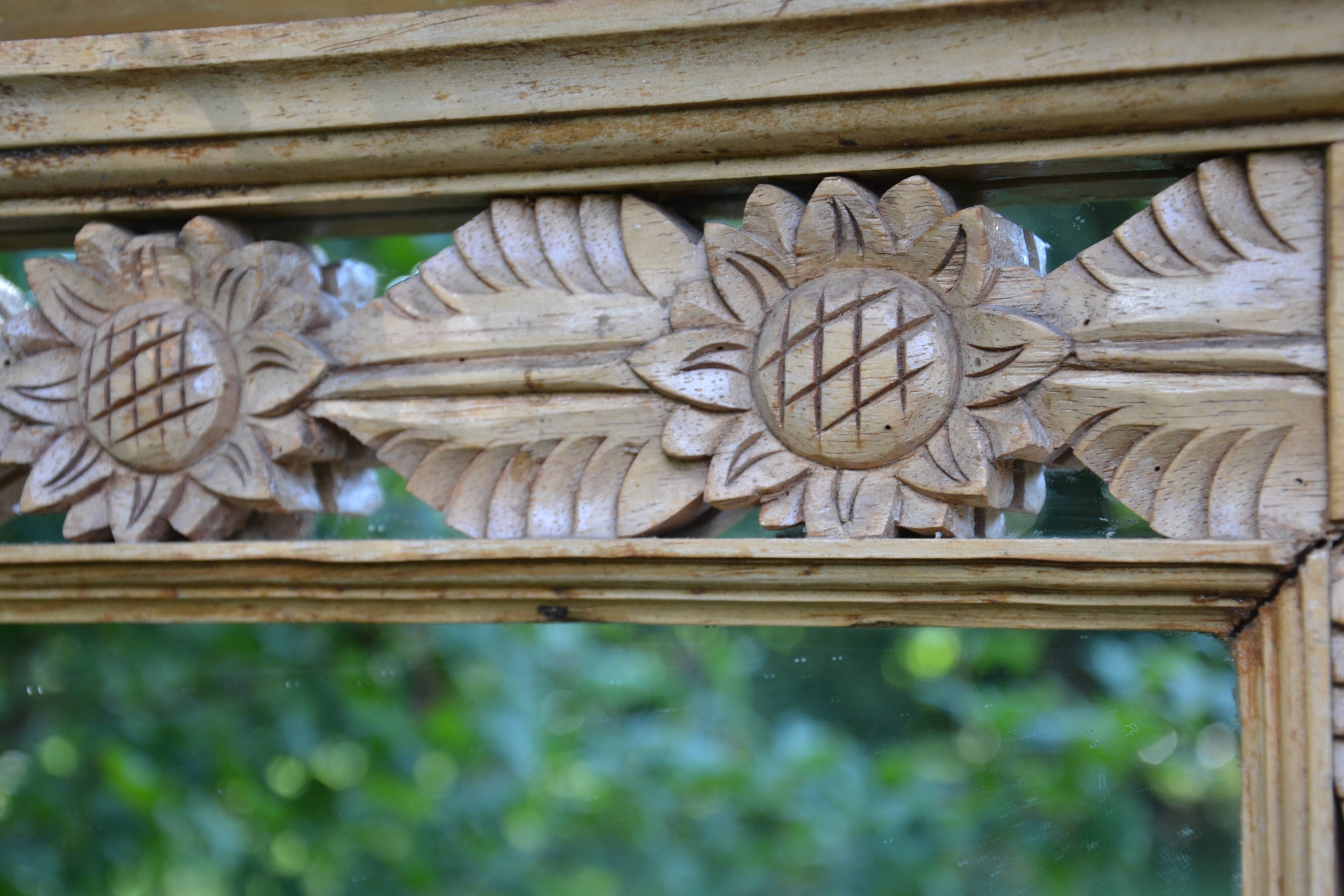 Large carved wooden mirror