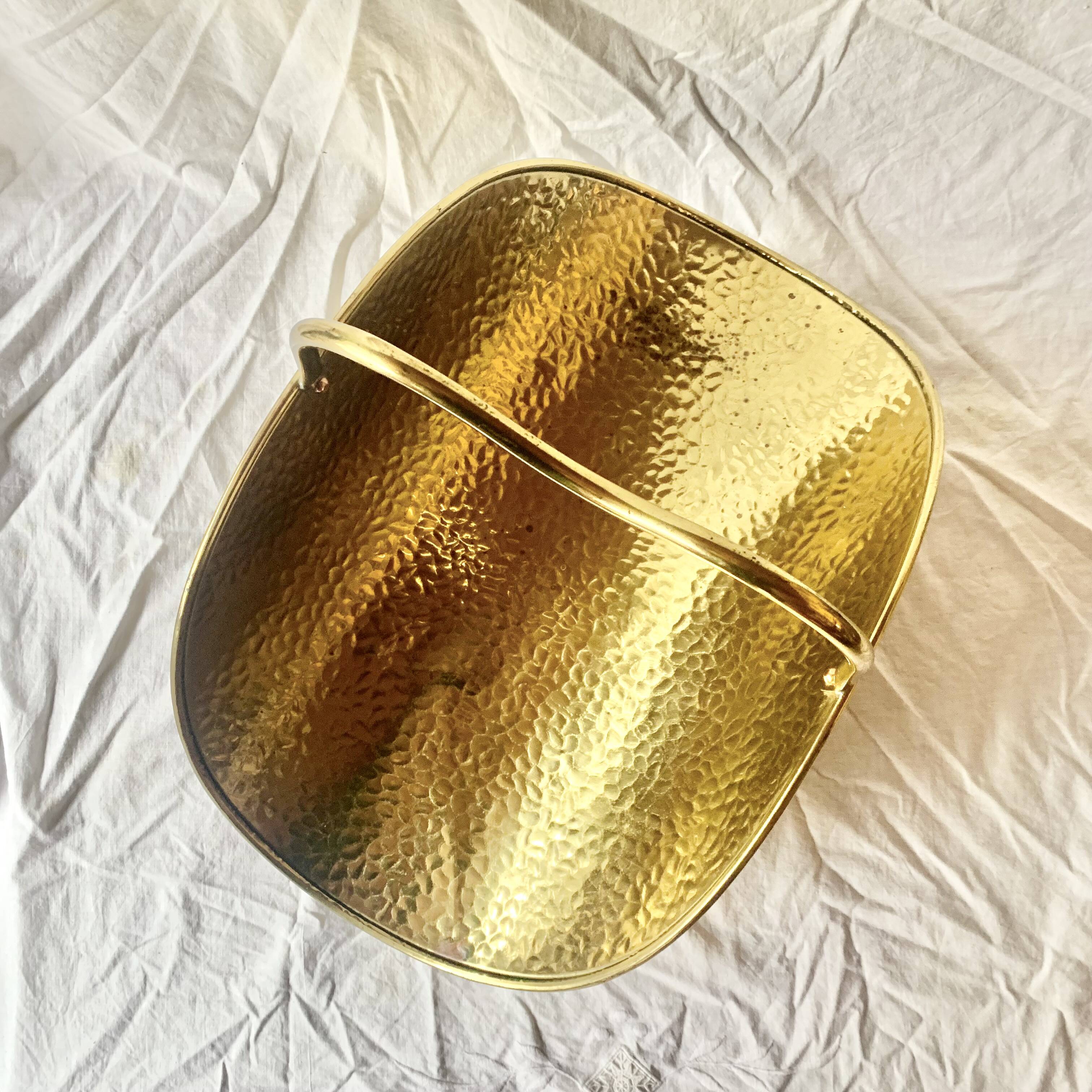 Vintage hammered brass log holder