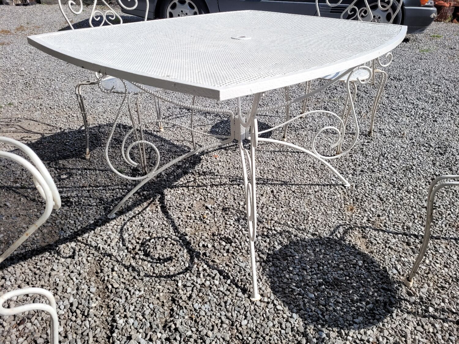 Old wrought iron garden furniture, table + 2 armchairs + 2 chairs