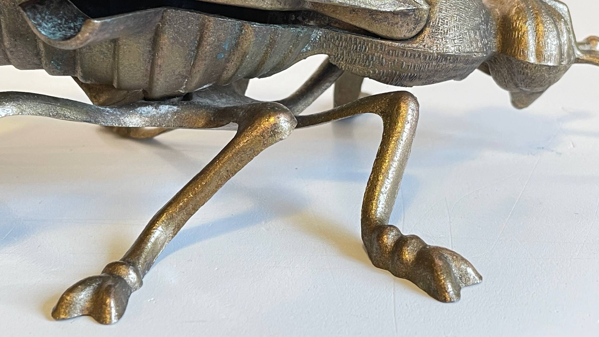 Vintage fly ashtray in patinated metal