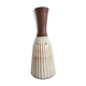 Small brown vintage vase with white enamels