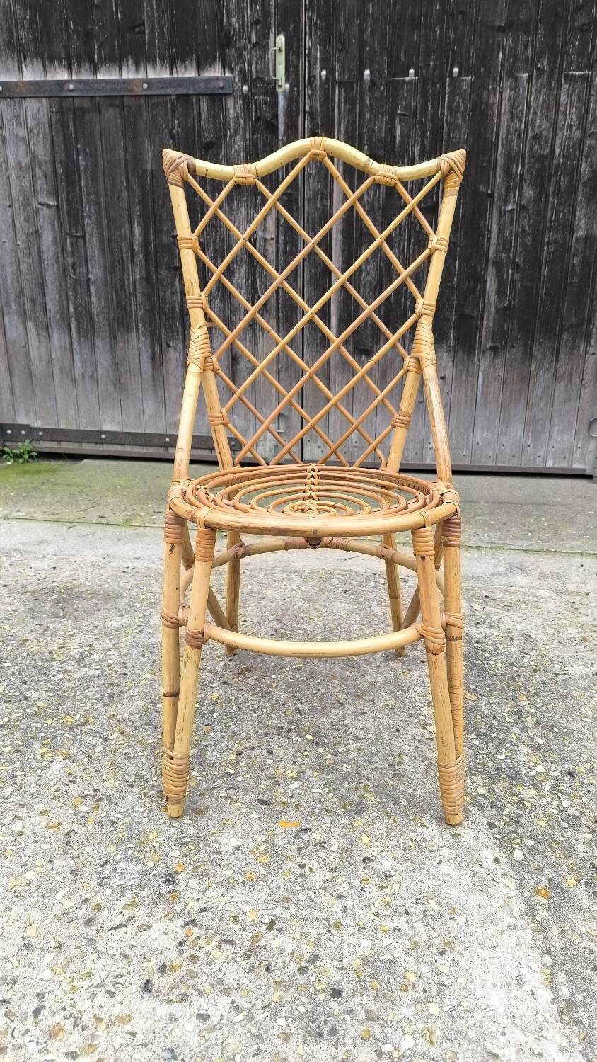 Rattan chair by Louis Sognot 1960